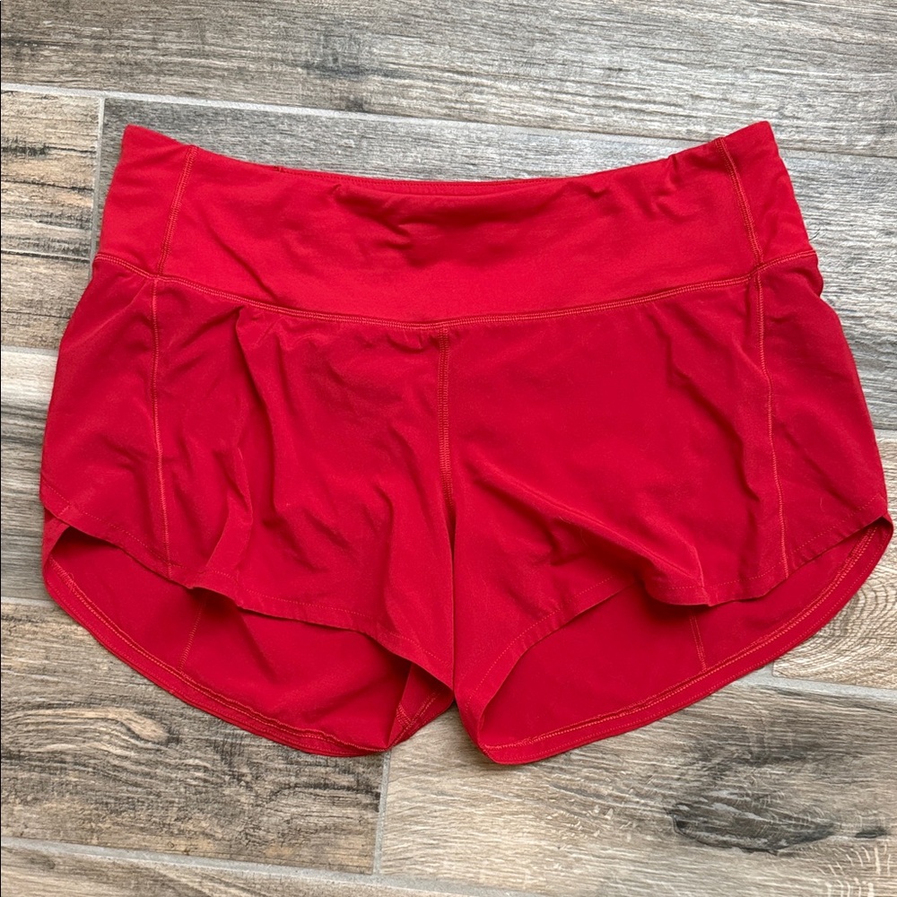 lululemon mid rise Red speed up shorts. Size 8